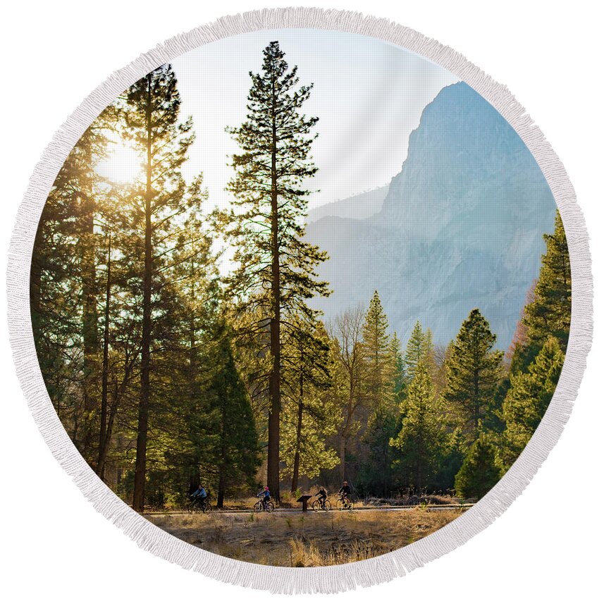 Landscape Round Beach Towel featuring the photograph How Small We Are... Bicycling in Yosemite by Susan Eileen Evans