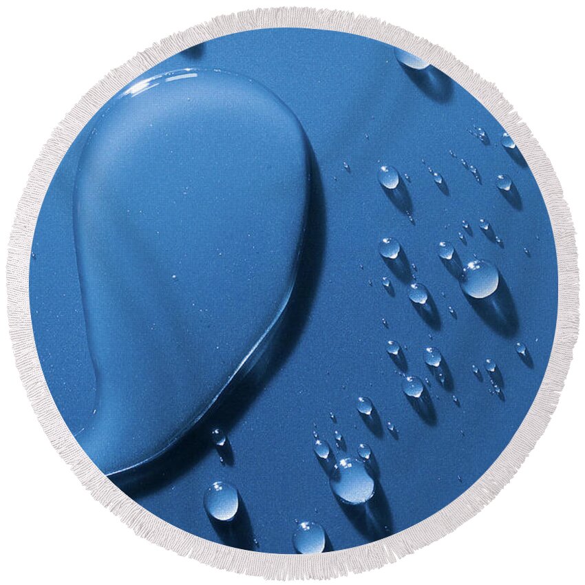 Water Round Beach Towel featuring the photograph Large and small water droplets viewed from above by Simon Bratt