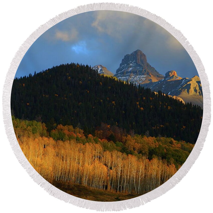 Autumn Round Beach Towel featuring the photograph Late afternoon light on the San Juans by Jetson Nguyen
