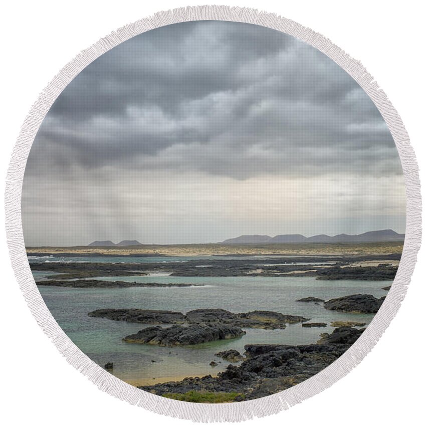 Fuerteventura Round Beach Towel featuring the photograph Lava coast and ocean by Patricia Hofmeester