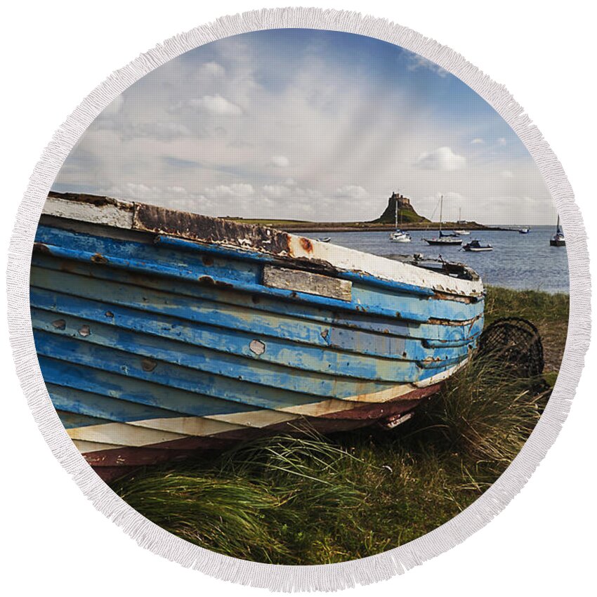 Northumberland Round Beach Towel featuring the photograph Lindisfarne boats - Landscape. by John Paul Cullen