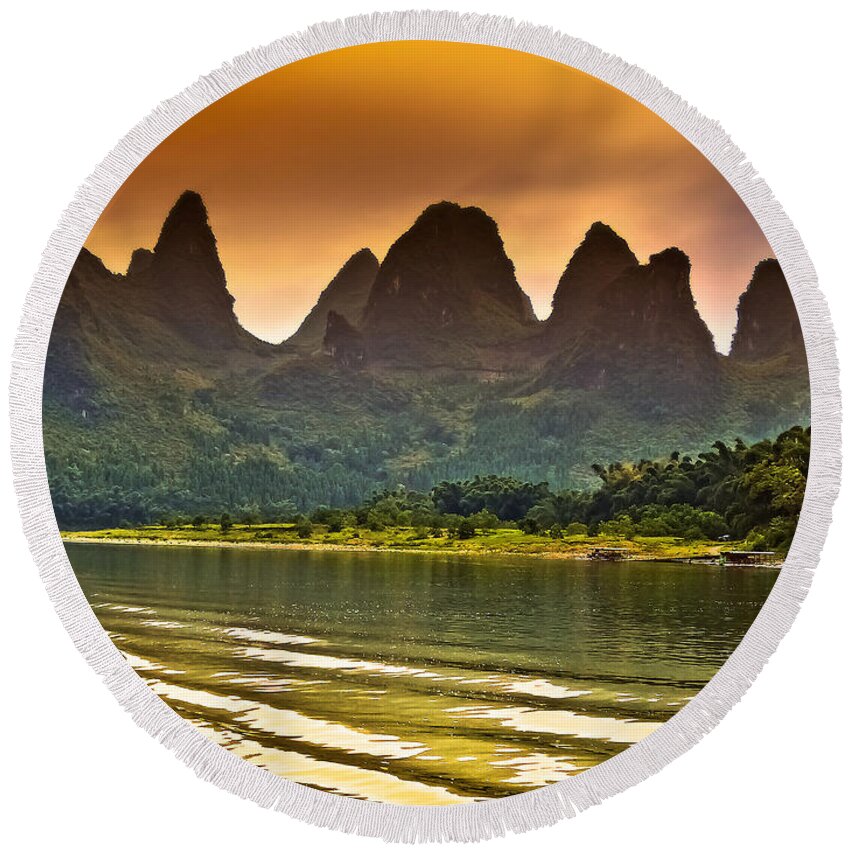 Sunset Round Beach Towel featuring the photograph Long wave seems brush-China Guilin scenery Lijiang River in Yangshuo by Artto Pan