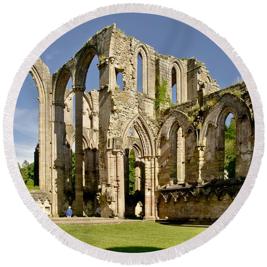 Abbey Round Beach Towel featuring the photograph Magnificent ruins. by Elena Perelman