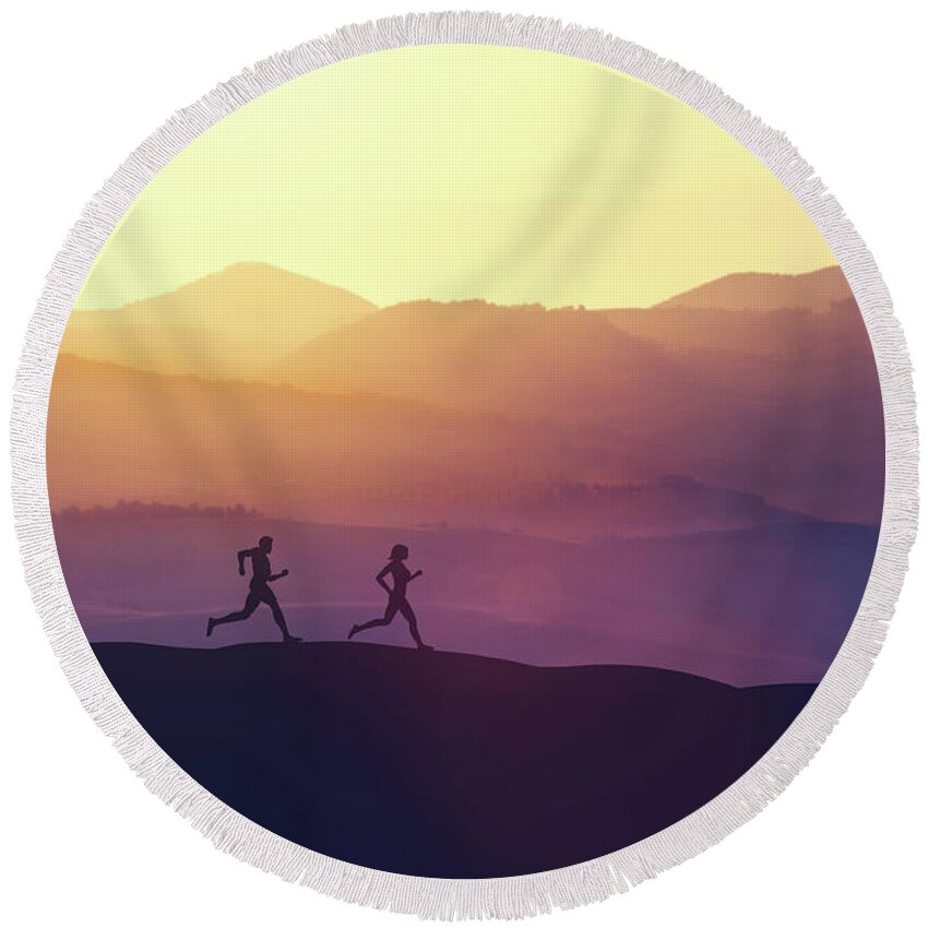 Man Round Beach Towel featuring the photograph Man and woman running on a hill in the country by Michal Bednarek