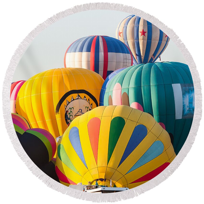 Hot Air Balloons Round Beach Towel featuring the photograph Massive colors by Charles McCleanon