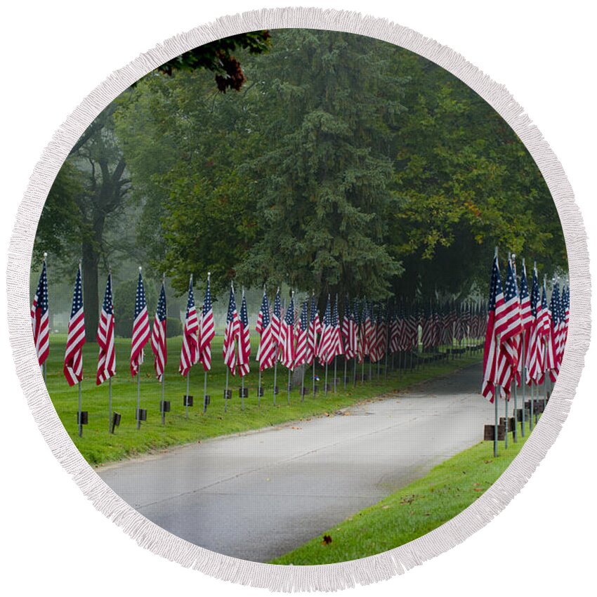 Memorial Day Round Beach Towel featuring the photograph Memorial Flags by Kevin Cable
