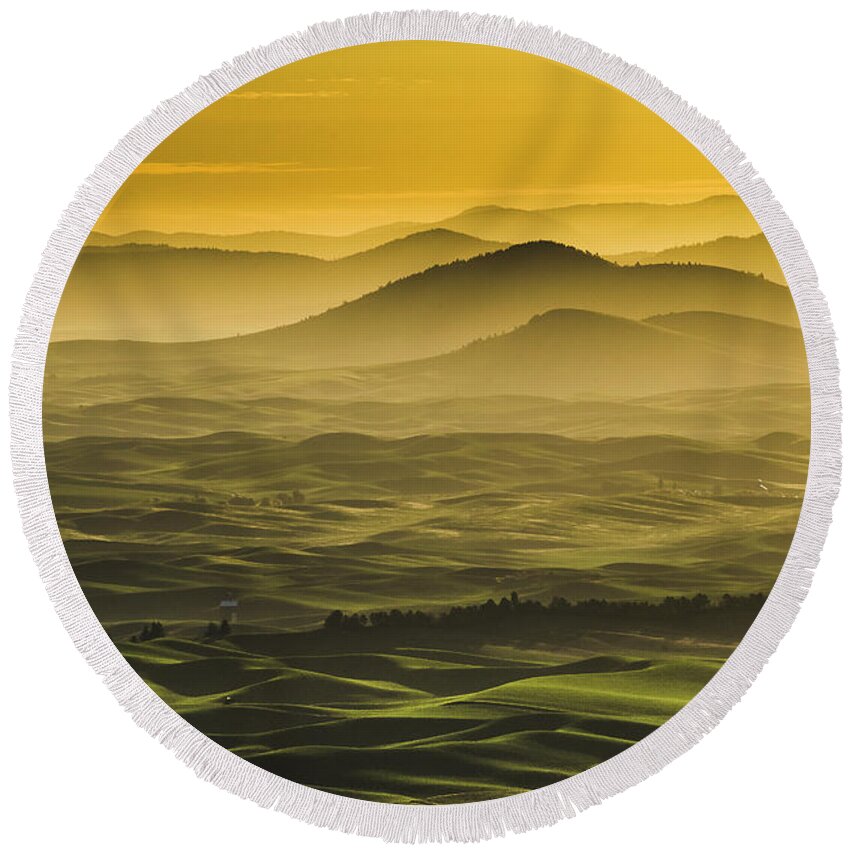 Agriculture Round Beach Towel featuring the photograph Misty morning at Palouse. by Usha Peddamatham