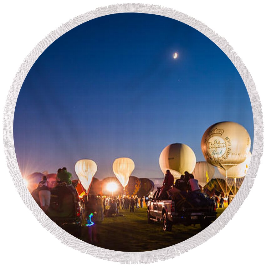 Multiple Hot Air Balloons Round Beach Towel featuring the photograph Multiple Hot air Balloons night glow by Charles McCleanon