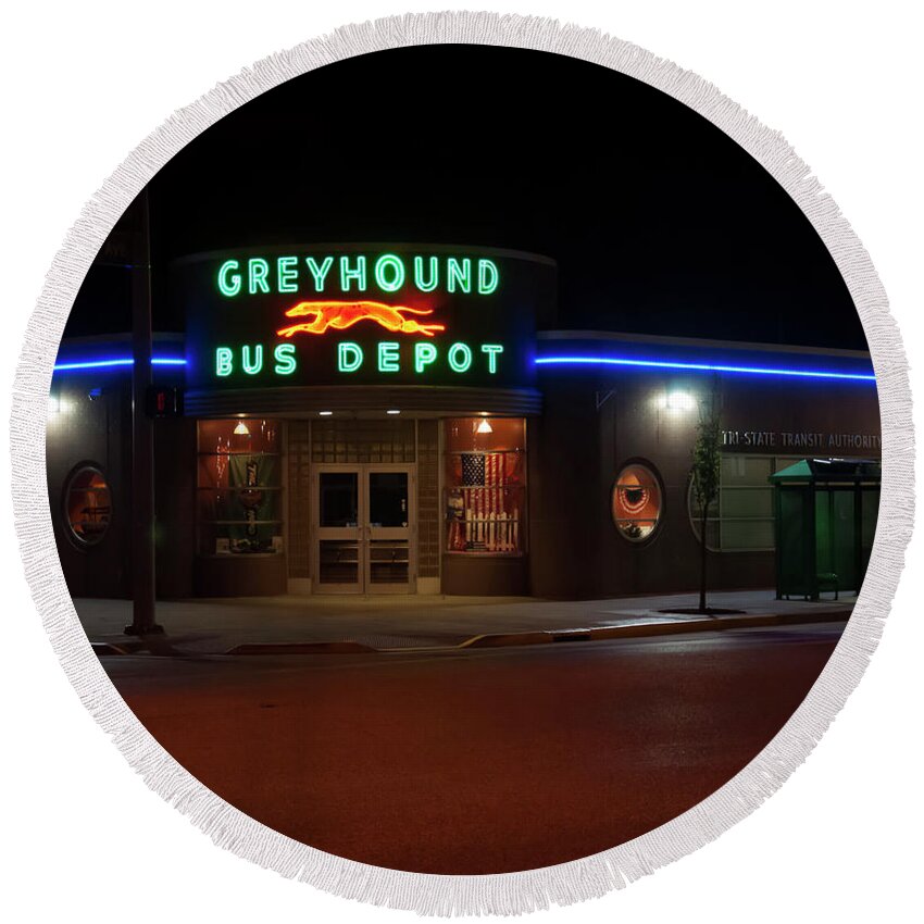 Neon Greyhound Round Beach Towel featuring the photograph Neon Greyhound bus depot sign by Flees Photos