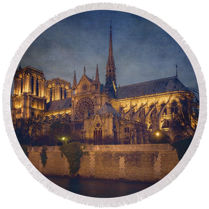 Joan Carroll Round Beach Towel featuring the photograph Notre Dame on the Seine Textured by Joan Carroll