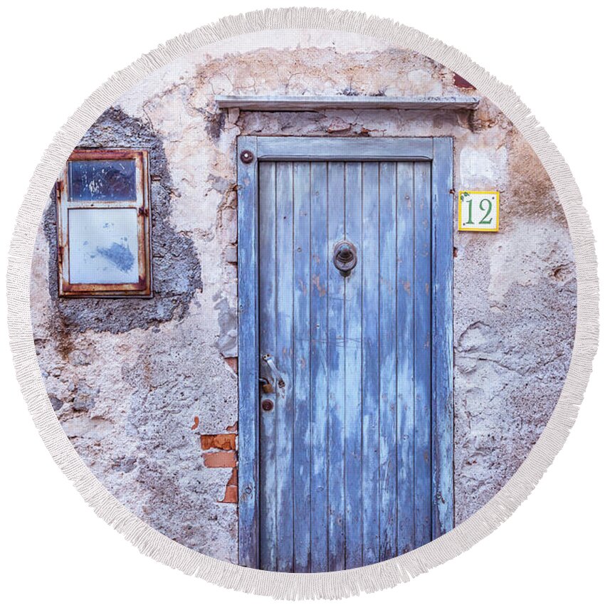 Architecture Round Beach Towel featuring the photograph Old Blue Italian Door by Maria Heyens