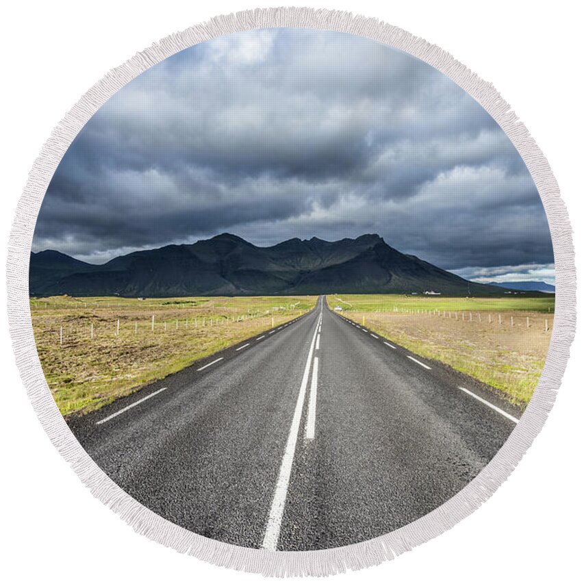 Iceland Round Beach Towel featuring the photograph On the road in Iceland by Didier Marti