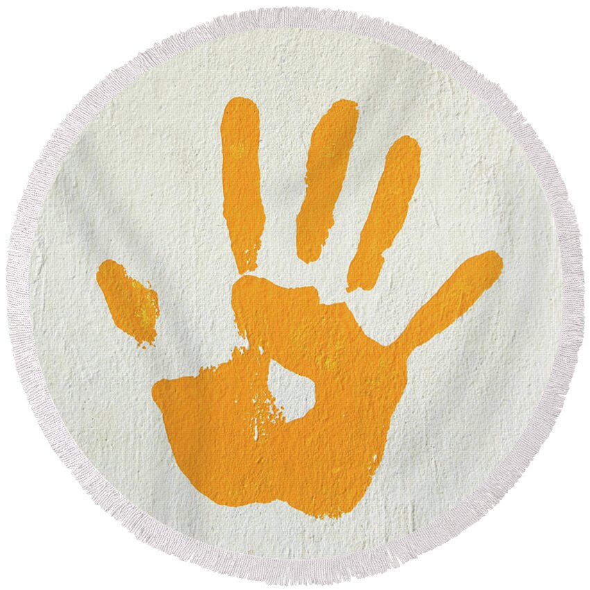 Print Round Beach Towel featuring the photograph Orange handprint on a wall by Dutourdumonde Photography