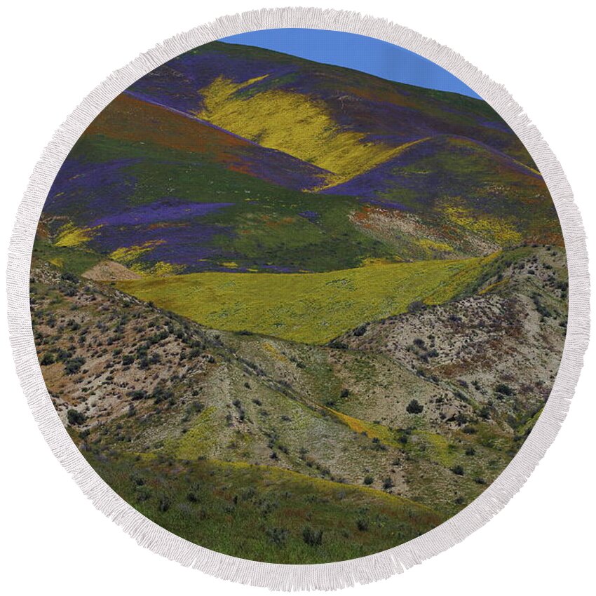 Wildflower Round Beach Towel featuring the photograph Pastel of colors blanket the Temblor Range at Carrizo Plain National Monument by Jetson Nguyen