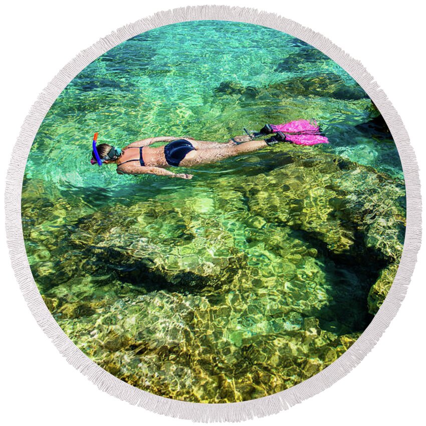 Woman Round Beach Towel featuring the photograph Pretty Woman in Bikini Snorkeling through Turquoise Water at the Coast by Andreas Berthold