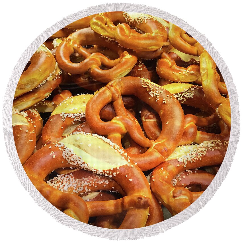 Pretzel Round Beach Towel featuring the photograph Pretzels in a bakery by GoodMood Art