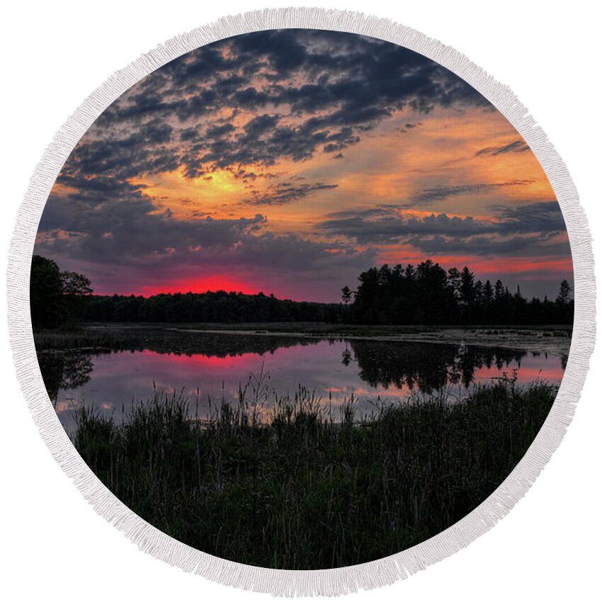 Sunset Round Beach Towel featuring the photograph Red Sunset Over Bentley Pond by Dale Kauzlaric