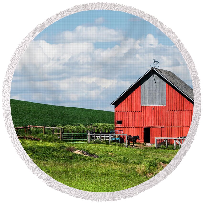 Agriculture Round Beach Towel featuring the photograph Reddest barn in Palouse. by Usha Peddamatham