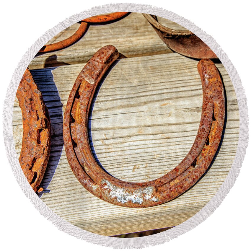Architecture Round Beach Towel featuring the photograph Rusty Horseshoes Found by Curators of the Ghost Town of St. Elmo by Peter Ciro