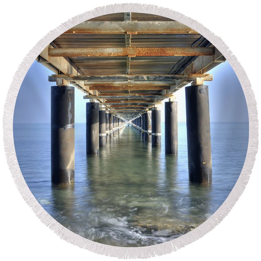 Dock Round Beach Towel featuring the photograph Rusty Pier on the ocean by Michalakis Ppalis