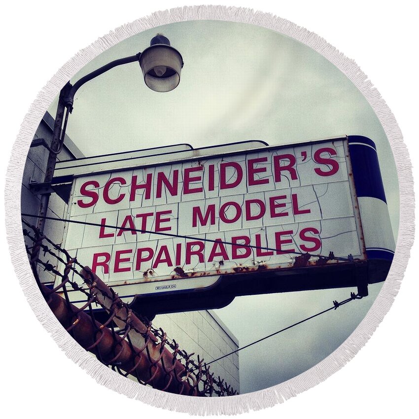 Breckenridge Round Beach Towel featuring the photograph Schneider Auto Parts Sign by Chris Brown