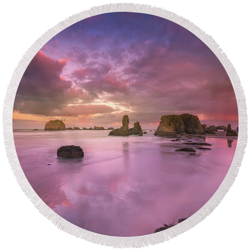 Oregon Round Beach Towel featuring the photograph Seagull, seastacks and colorful clouds by William Lee