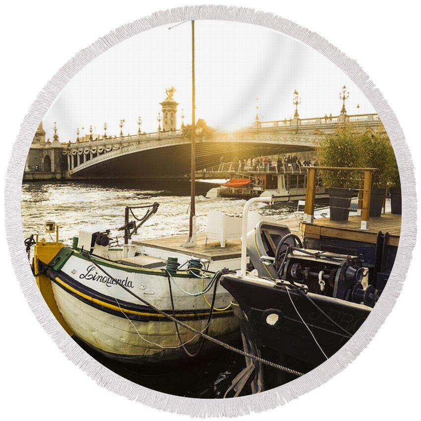 Seine Round Beach Towel featuring the photograph Seine river with barges and boats, Pont de Alexandre bridge behind, Paris France. by Perry Van Munster