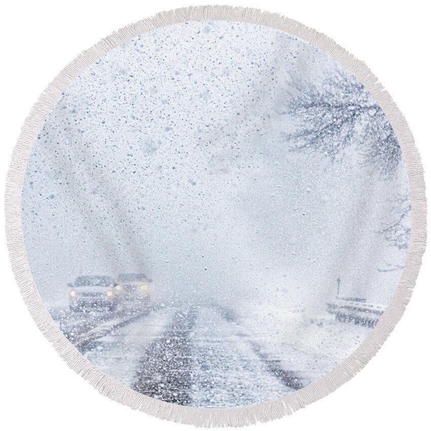 Snow Squall Round Beach Towel featuring the photograph Snow squall driving in Canada by Tatiana Travelways