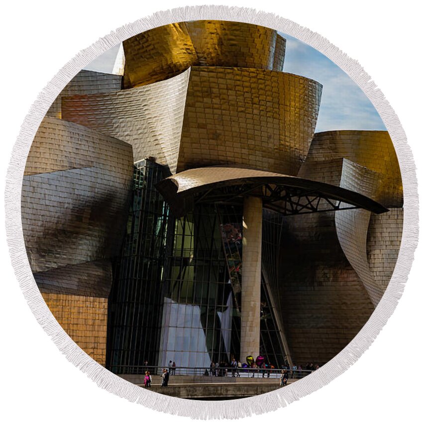 Spain Bilbao Guggenheim Museum Basque Country Frank Gehry Contemporary Architecture Nervion River City Daring And Innovative Curves Building Exterior Spectacular Building Deconstructivism Ferrovial Clad In Glass Round Beach Towel featuring the photograph The Guggenheim Museum Spain Bilbao by Andy Myatt