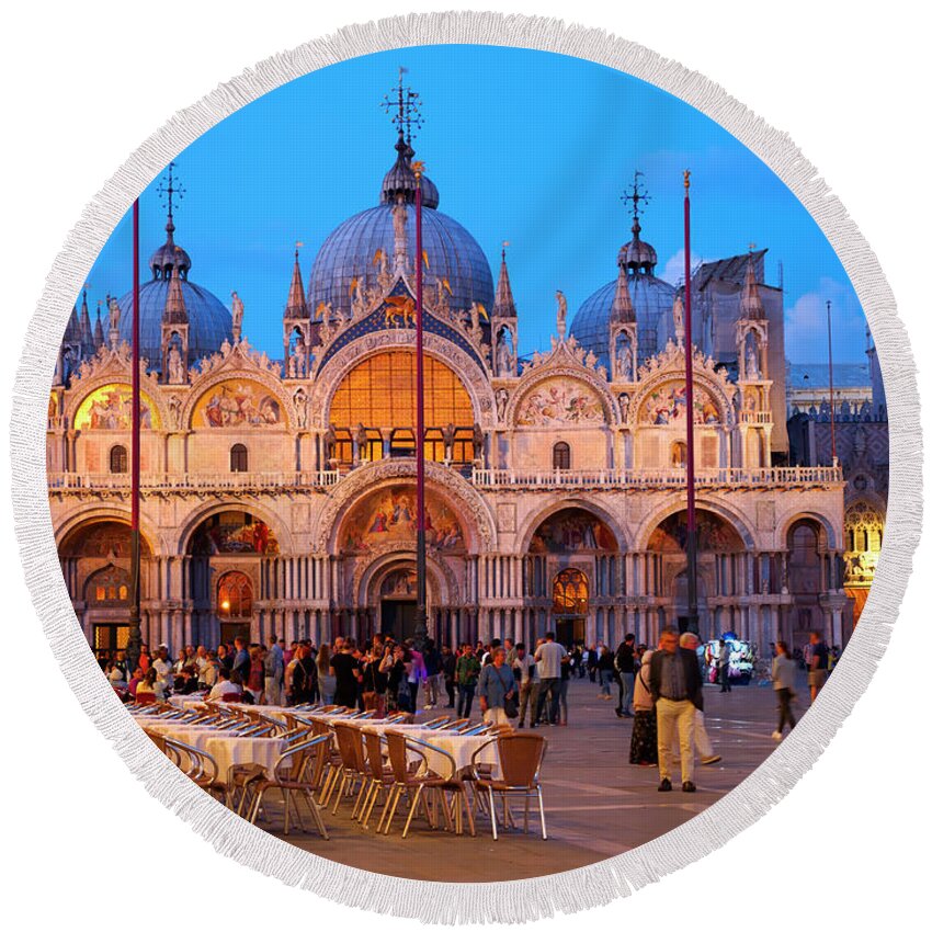 St Mark's Square Round Beach Towel featuring the photograph St Mark's Square and the Basilica at night in Venice by Louise Heusinkveld
