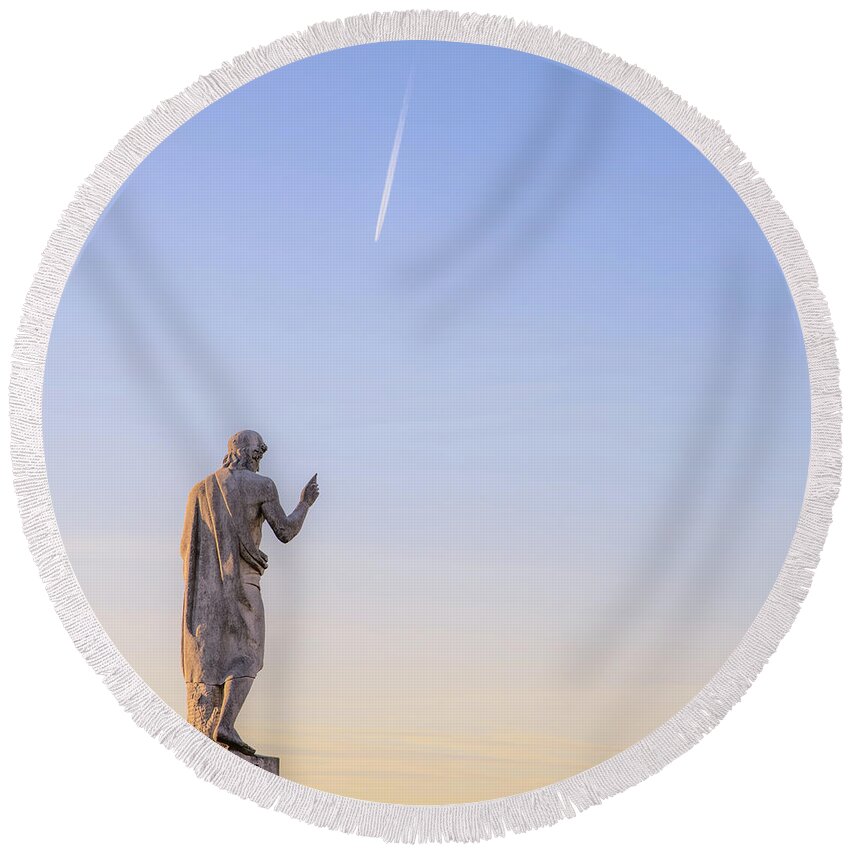 Milan Round Beach Towel featuring the photograph Statue pointing to an airplane trail by Alexandre Rotenberg