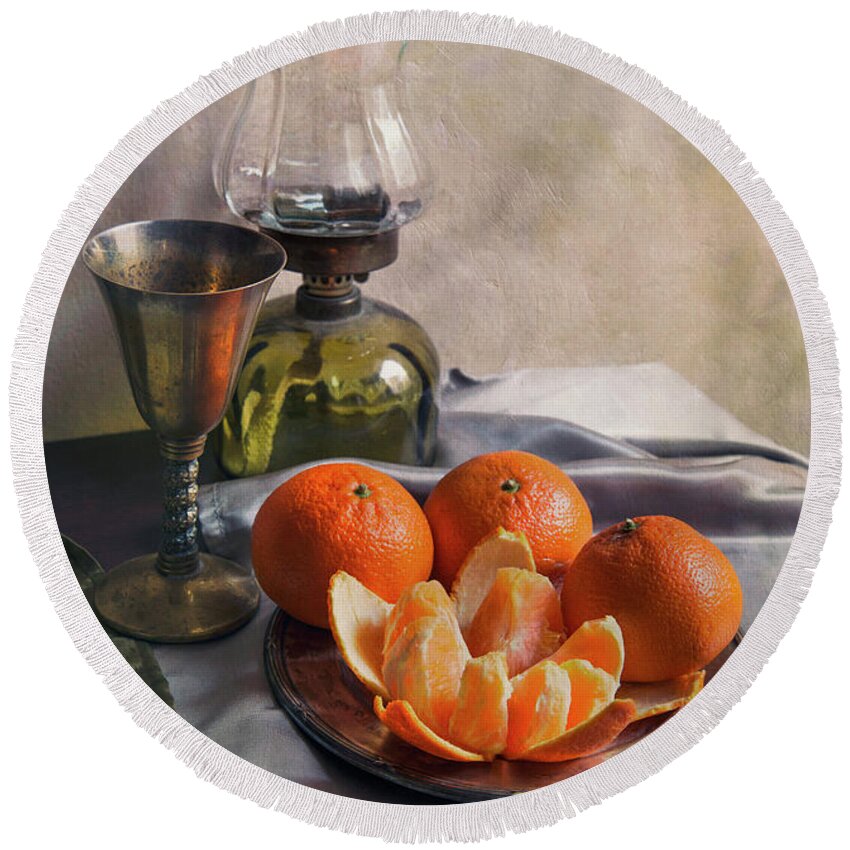 Still Life Round Beach Towel featuring the photograph Still life with fresh tangerines and oil lamp by Jaroslaw Blaminsky