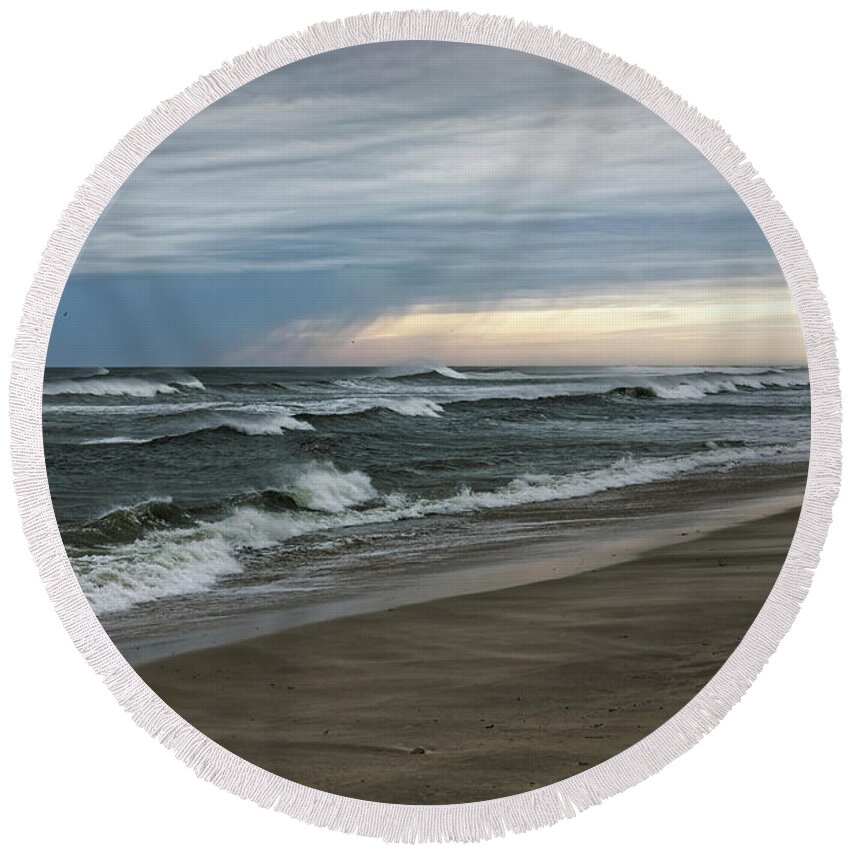 Atlantic Ocean Round Beach Towel featuring the photograph Storm off the coast by Steve Gravano
