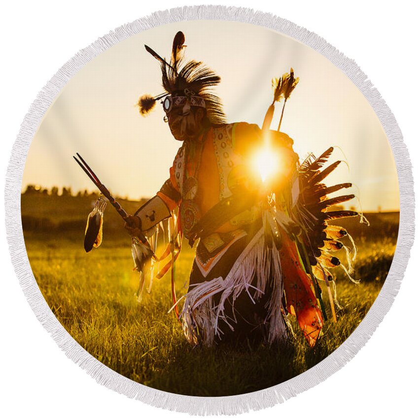 A Traditional Native American Indian Dances At Sunset At A Powwow In Montana. Round Beach Towel featuring the photograph Sun Dance by Todd Klassy