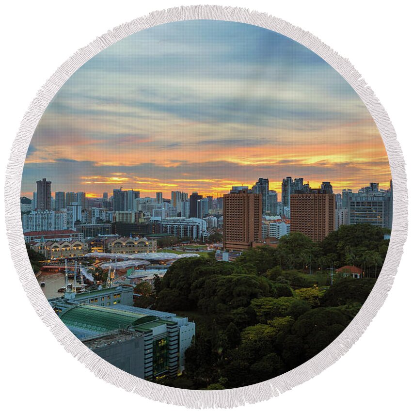 Sunset Round Beach Towel featuring the photograph Sunset over Clarke Quay and Fort Canning Park by David Gn