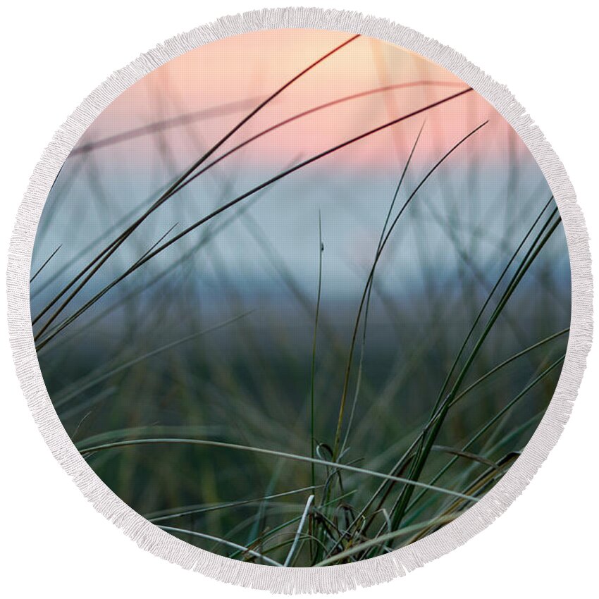 Sun Round Beach Towel featuring the photograph Sunset through the marsh grass by Spikey Mouse Photography