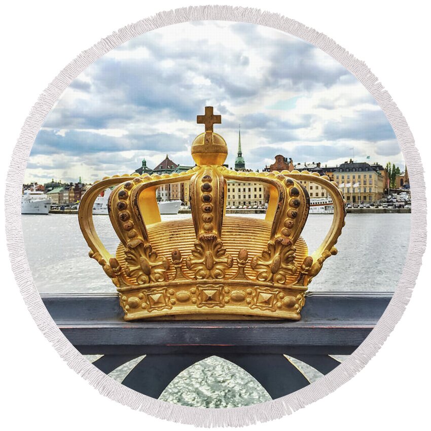 Stockholm Round Beach Towel featuring the photograph Swedish royal crown on a bridge in Stockholm by GoodMood Art
