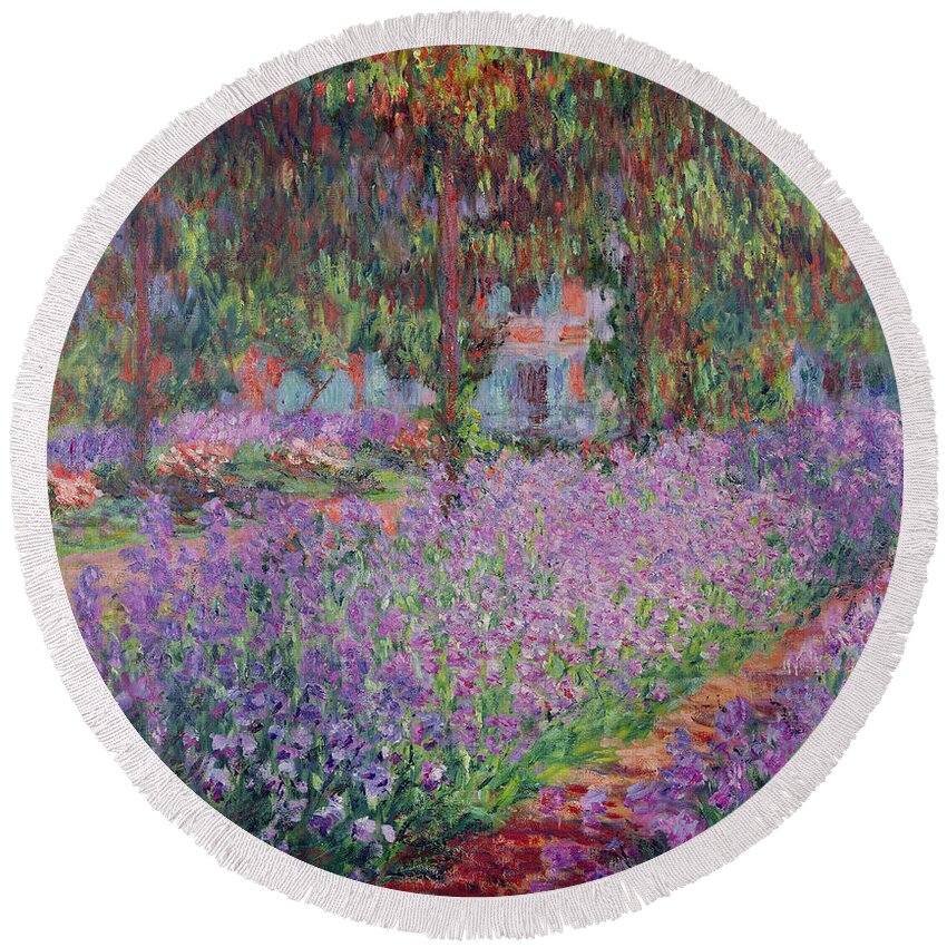 The Round Beach Towel featuring the painting The Artists Garden at Giverny by Claude Monet