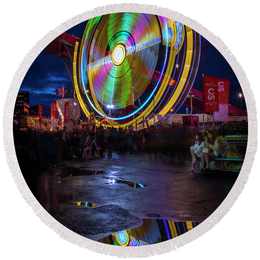 Calgary Round Beach Towel featuring the photograph The Spinning Midway Rides by Bill Cubitt