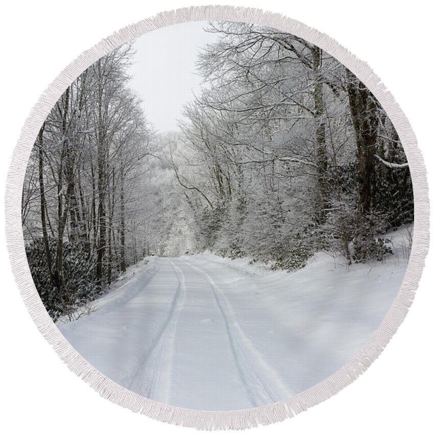 Snow Round Beach Towel featuring the photograph Tire Tracks In Fresh Snow by D K Wall