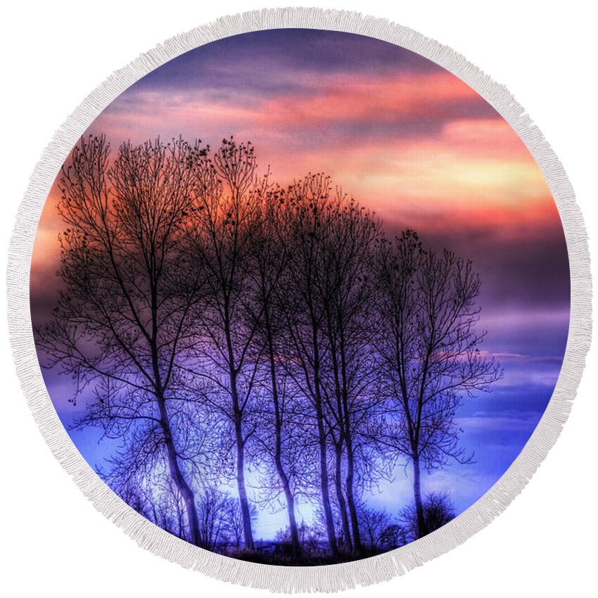 Countryscape Round Beach Towel featuring the photograph Trees and twilight by Roberto Pagani
