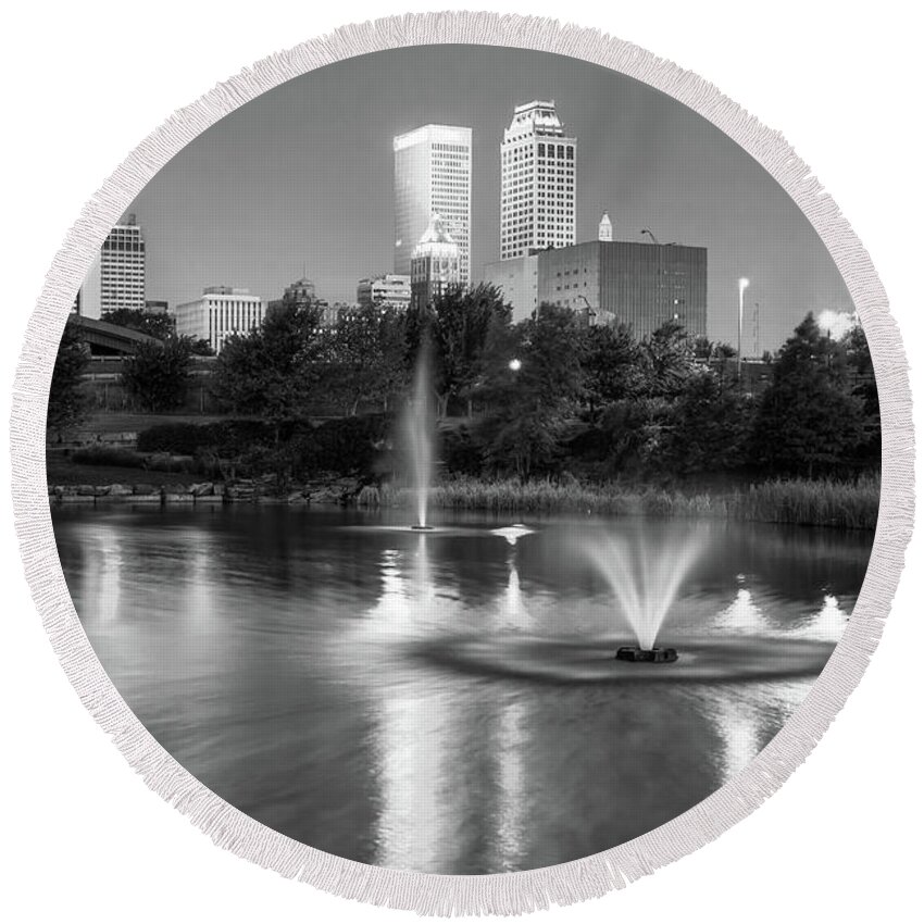 Tulsa Downtown Round Beach Towel featuring the photograph Tulsa Downtown Skyline Water Reflections - Black and White by Gregory Ballos