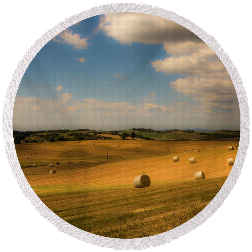 Tuscany Round Beach Towel featuring the photograph Val d'Orcia field with hay balls by Wolfgang Stocker