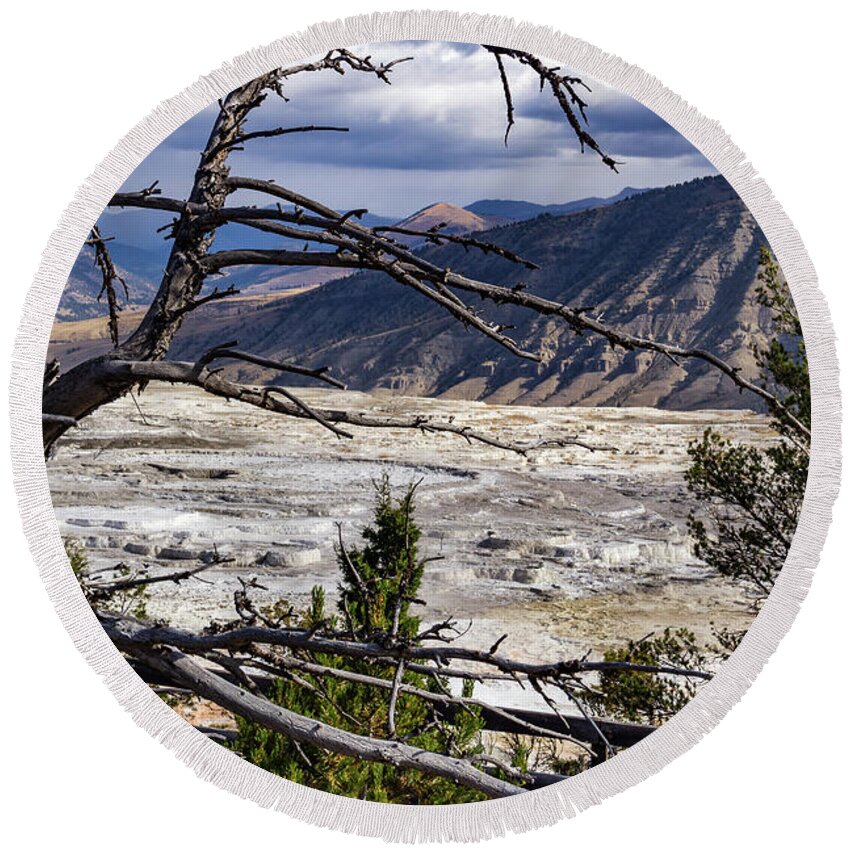 America Round Beach Towel featuring the photograph View of the travertine and mountains from the pathway at Mammoth Hot Springs by Roslyn Wilkins