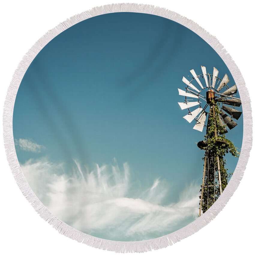 Canada Round Beach Towel featuring the photograph Vines Growing Up a Windmill in Canada by Bryan Mullennix