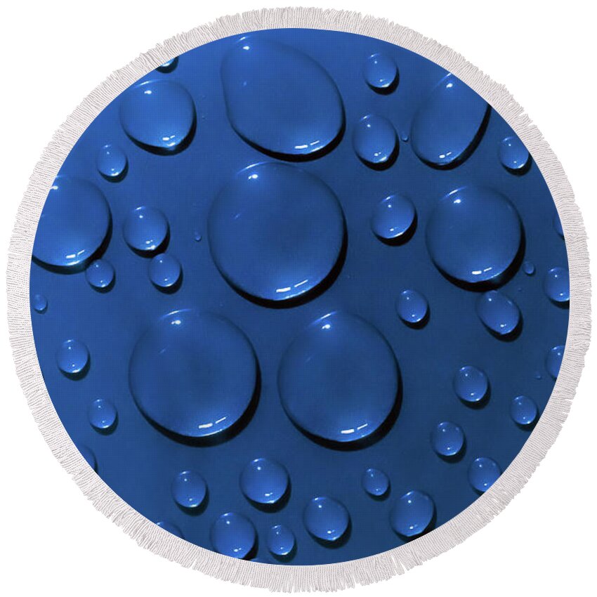 Water Round Beach Towel featuring the photograph Water drops pattern on blue background by Simon Bratt