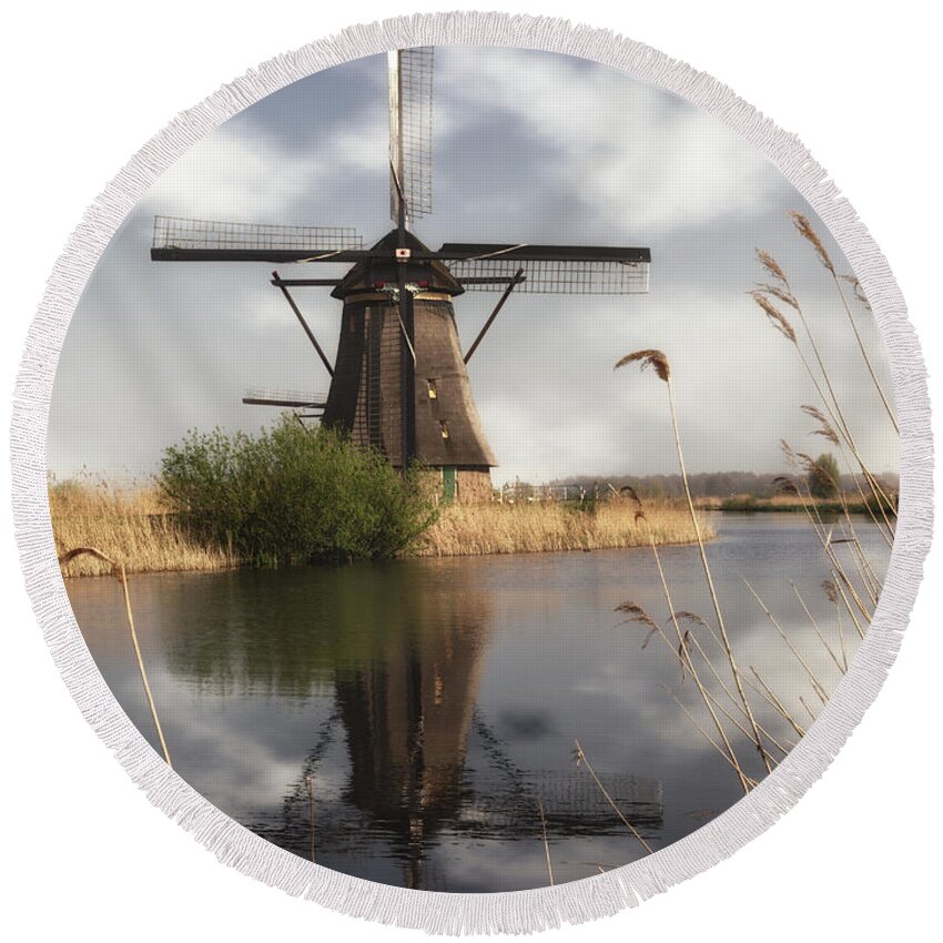 Windmill Round Beach Towel featuring the photograph Windmill at Kinderdijk in Holland by Tim Abeln