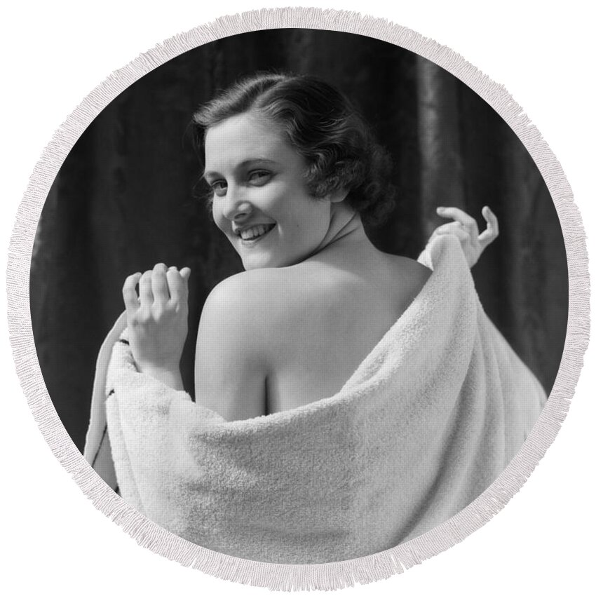 1930s Round Beach Towel featuring the photograph Woman Looking Over Shoulder In Towel by H. Armstrong Roberts/ClassicStock