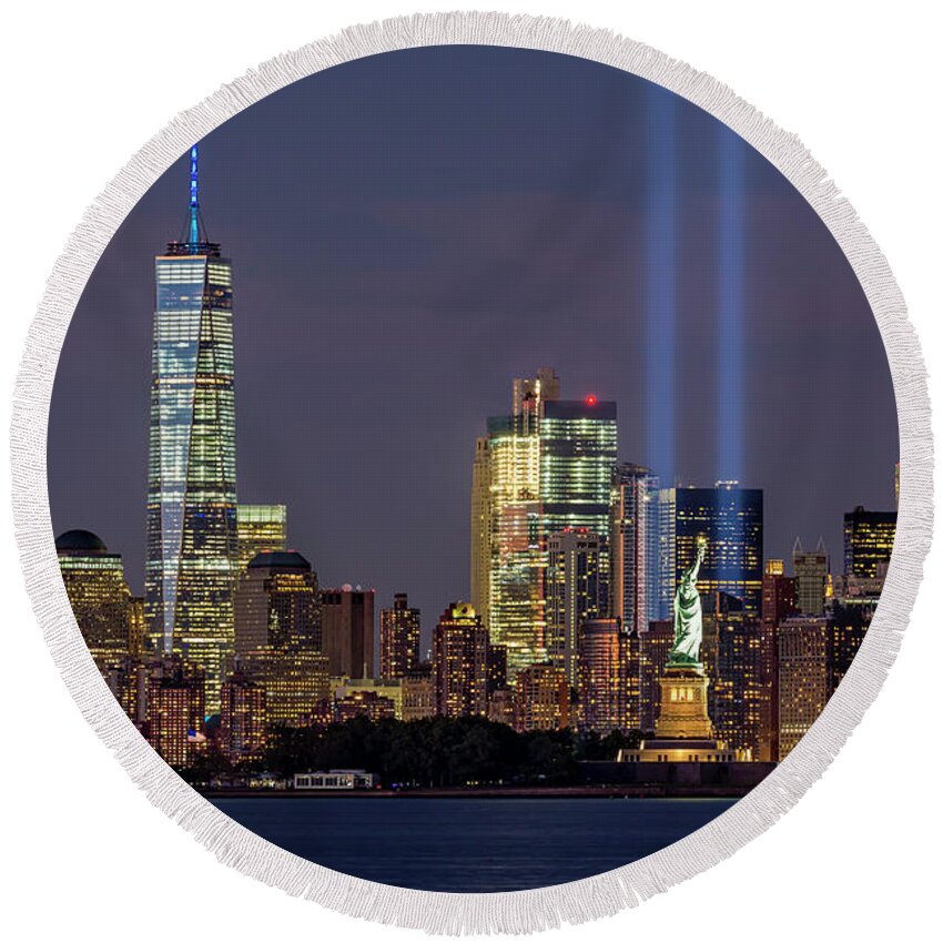 September 11 Round Beach Towel featuring the photograph World Trade Center WTC Tribute In Light Memorial by Susan Candelario