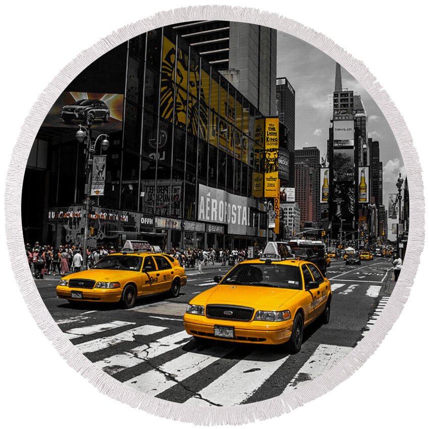 Manhattan Round Beach Towel featuring the photograph Yellow Cabs cruisin on the Times Square by Hannes Cmarits